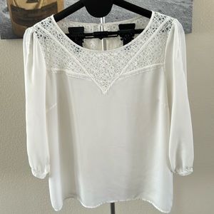 Lovely details on this cream top